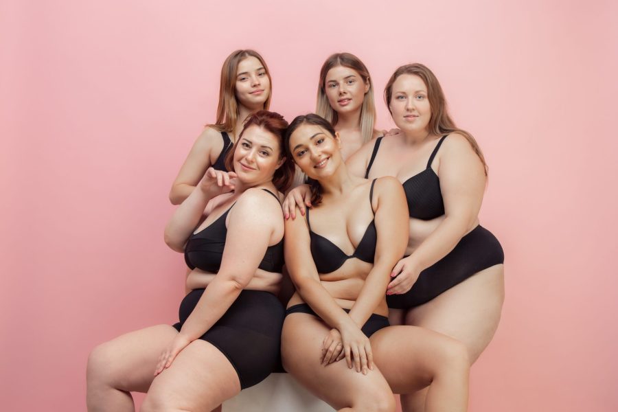 portrait-beautiful-young-women-with-different-shapes-posing-pink-scaled